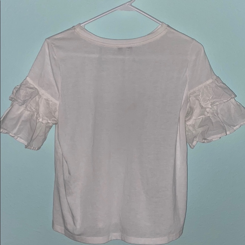 white ruffled t